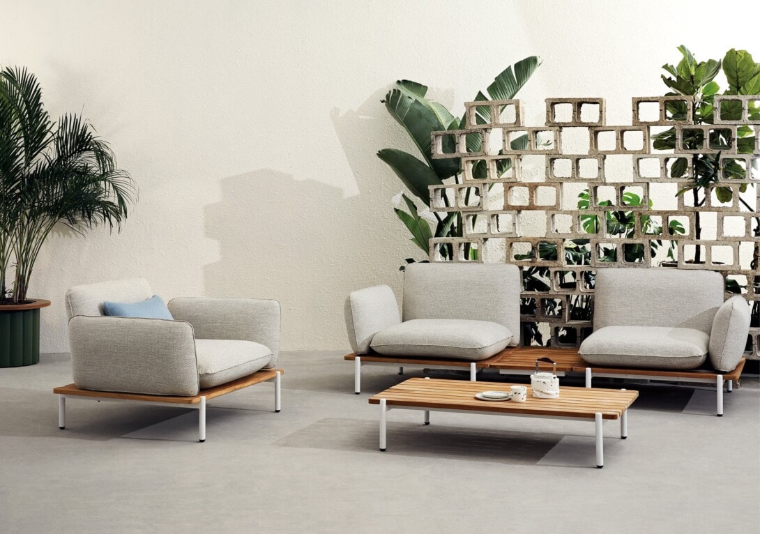 Kun Design Pillow outdoor Lounge Armchair: Fontelina 180 fabric, White frame with Teak base. Pillow End Table.
